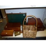 A wicker two bottle wine carrier, a wooden jewellery box plus three further boxes, a wooden glazed
