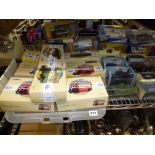 A large collection of die-cast model vehicles, mainly Corgi Classics [upstairs silver plate shelves]