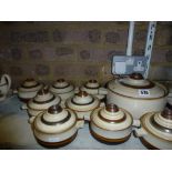 An extensive 1970s Denby dinner service including tureens, soup bowls and covers, dessert bowls,