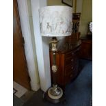 An impressive standard lamp with modern shade, probably Doulton though unmarked, on bronze stand