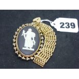 A 9 ct gold gate bracelet and a 9 ct gold-mounted Wedgwood jasper brooch, 11.5 gm weighable WE DO