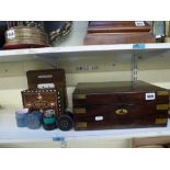 A 19th century rosewood writing slope with plain brass mounts, a vintage perpetual calendar in