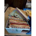 A small box of 7 in records, rock and pop from the 1960s-80s, including a Beatles Magical Mystery