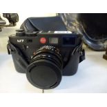A Leica M7 camera in black, no. 2884135, with Summicron-M 1:2/50 E39 lens, black leather 14 870