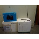 A pair of Logitech speakers Z130, a Ruark audio table top radio and a Pure Evoke 1S DAB radio [black