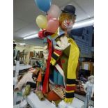A large Bub Nistis of Barcelona felt clown figurine plus another smaller, and a Matador toy and