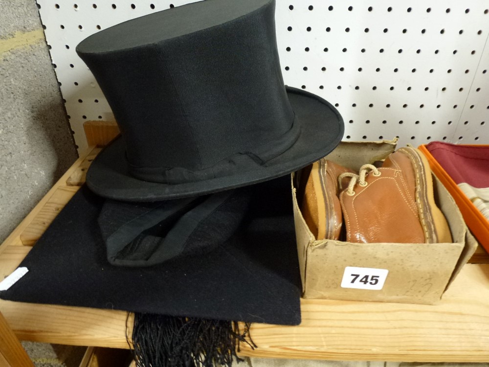 A black silk collapsing top hat with Gibus 28 Chandos Street, London label, a mortar board, and a