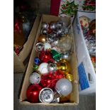 Seven boxes of Christmas decorations including baubles, lights etc. [under G40, G37 and G34] WE DO