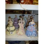 Seven Wedgwood figurines of ladies. [s46] WE DO NOT TAKE CREDIT CARDS OR CASH. STORAGE IS CHARGED