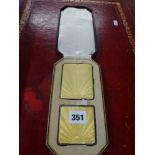 An elegant George V set of lady's cigarette case and compact, in silver and yellow enamel,