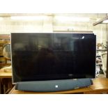 A 42 in TCL flat screen television and a JBL sound bar [on lot 863] WE DO NOT TAKE CREDIT CARDS OR