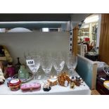A set of 18 Stuart crystal wineglasses, two Limoges trinket boxes, miniature model teapots, snuff