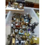 60 table lighters of various makes including Touch Tip lighters and some styled as a Chinaman, a