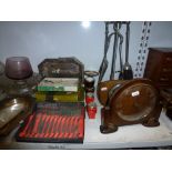 A mixed lot including two wooden mantel clocks, boxed cutlery, a fireside set, glass fruit bowls two