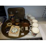 A mixed lot including a set of Wade Lyons Tetley mugs, a circular brass tray, a pottery Stein with