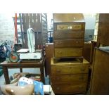 A 19th century mahogany small chest of three long drawers on bracket feet with line inlay and a