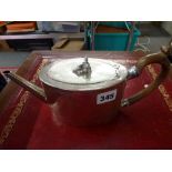 A George III silver oval teapot with Chinese figural knop and wooden handle, London 1784, 13.9 ozt