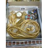 A box of costume jewellery including an impressive 1971 Christian Dior gilt-metal snake necklace,