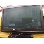 A Panasonic Viera 42 in flat screen television with remote control [on lot 851] WE DO NOT TAKE