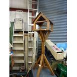 A large wooden bird house [back door] WE DO NOT TAKE CREDIT CARDS OR CASH. STORAGE IS CHARGED