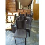 A set of eight modern dining chairs by Frag Handmade in Italy each with a stitched leather back seat