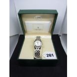 A Gucci lady's quartz wristwatch, on integral bracelet, in two-tone steel, with date aperture,