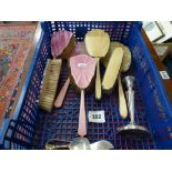 A four-piece dressing-table set in silver and pink enamel, Birmingham 1933/34, together with a