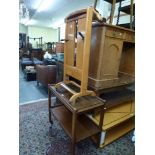 A mahogany two-tier tea trolley, an old trouser press and two oak occasional tables one on barley-