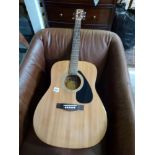 A Yamaha F310 Acoustic Guitar. [on lot 907] WE DO NOT TAKE CREDIT CARDS OR CASH. STORAGE IS