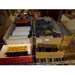 A collection of 0 gauge model railway rolling stock including wagons and brake vans, RF Stedman