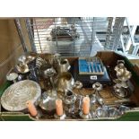 Two cartons, large and small, containing a variety of silver-plated items and other metalware,
