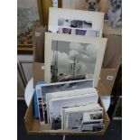 A collection of professional photographs in large and small format including studies of ships, a