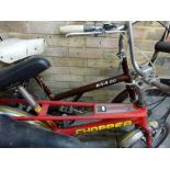 A red Raleigh Chopper bike plus a BSA bike [back door] WE DO NOT TAKE CREDIT CARDS OR CASH.