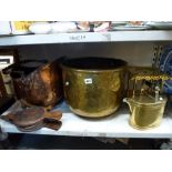 A good shelf of metalwares including a large copper coal scuttle, a large brass log bin, a brass