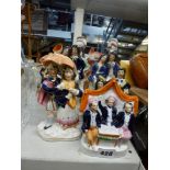 Seven Staffordshire figurines of couples. [s21] WE DO NOT TAKE CREDIT CARDS OR CASH. STORAGE IS