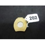 A Dunhill cigar cutter faced in 9 ct gold, London 1960 WE DO NOT TAKE CREDIT CARDS OR CASH.