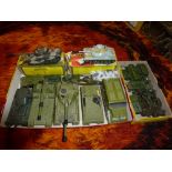 Two trays of assorted mainly Dinky military vehicles, tanks and guns, and two boxed Corgi tanks [