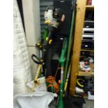 A quantity of electrical tools including a petrol strimmer by Ryobi 25cc, an electric strimmer, a