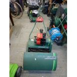 A Qualcast Suffolk Punch 43DL petrol lawnmower [back door] WE DO NOT TAKE CREDIT CARDS OR CASH.