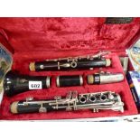 A cased Regent five-piece clarinet. [on lot 936] WE DO NOT TAKE CREDIT CARDS OR CASH. STORAGE IS