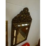 A highly decorative brass double-framed mirror with flower and shell surmount WE DO NOT TAKE