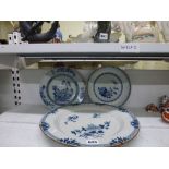 A good mid-18th century English delft charger painted with flowers in Chinese style, orange rim,