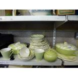 A Empire ware green check part dinner service including tureens and plates approximately 45