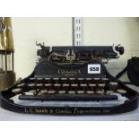 A vintage American small Corona typewriter [A] WE DO NOT TAKE CREDIT CARDS OR CASH. STORAGE IS