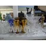 A quantity of glassware including brandy balloons, wine glasses, sherry glasses, glass bowls, vases,