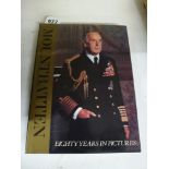 A book: Mountbatten - Eighty Years in Pictures, 1979, with dust jacket, signed by Lord