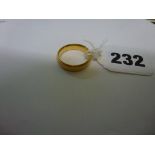 A 22 ct gold man's wedding ring, London 1918, 7.6 gm WE DO NOT TAKE CREDIT CARDS OR CASH. STORAGE IS