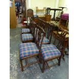 A set of five George III mahogany dining chairs well made and of good patina each with a