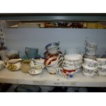 Two shelves of china including a Royal Albert Brigadoon pattern part tea and dinner service, an