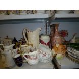 A mixed lot of china including a Masons mantel clock, a set of three Portmeirion white glazed